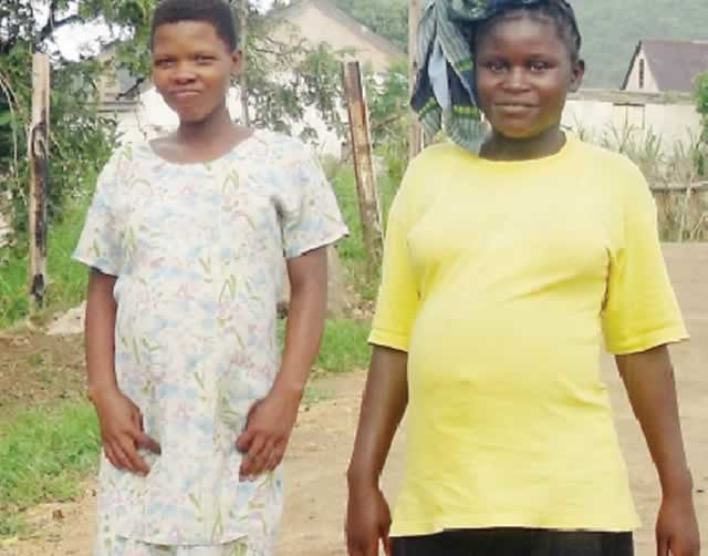 Pregnant women walk to a health centre in this file photo