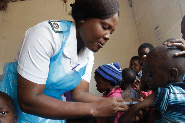 a-nurse-seen-vaccinating-a-child-to-prevent-rubella-measles