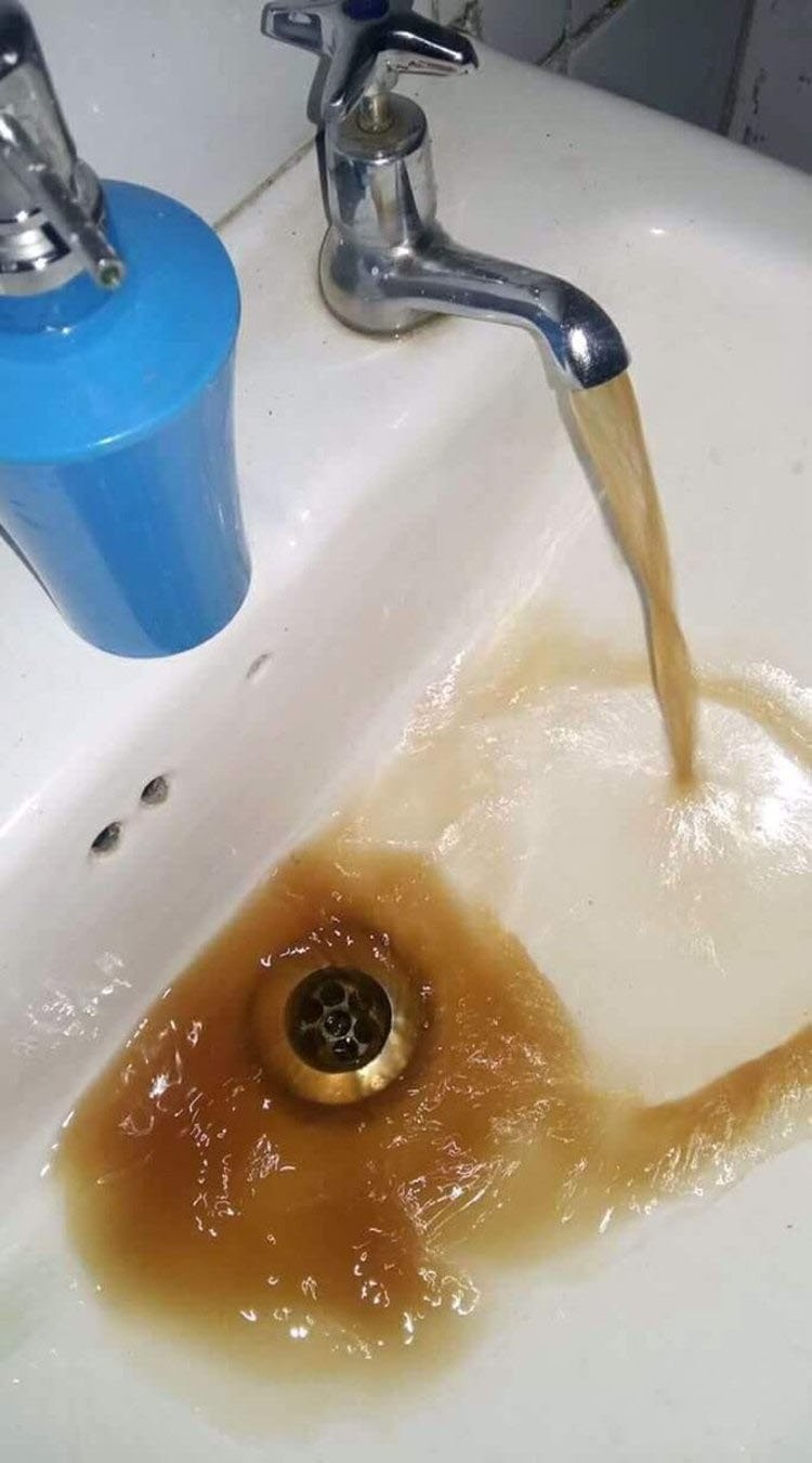 Discoloured flow: A Harare resident shared an image of water form their tap. — Source :Twitter